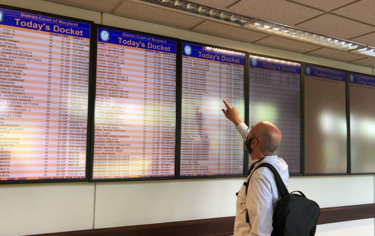 Digital signage displaying court docket and room number information