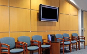 Hospital waiting room with video monitor